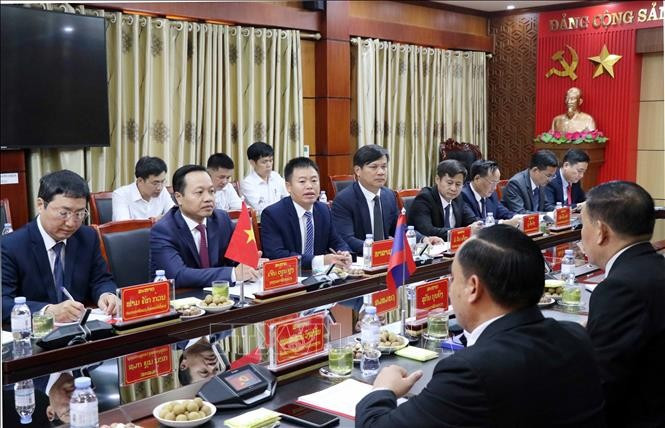 Participants at the meeting (Photo: VNA)