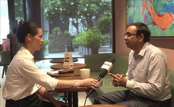 Journalist Rudroneel Ghosh speaks during an interview with the Vietnam News Agency’s resident correspondent in New Delhi. (Photo: VNA)