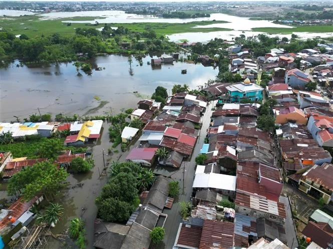 A flood-hit area in South Sulawesi, Indonesia, on December 24, 2024 (Photo: Xinua/VNA)