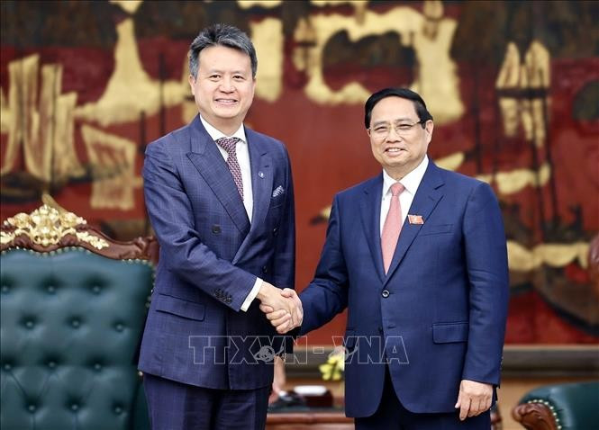 Prime Minister Pham Minh Chinh receives Director General of the World Intellectual Property Organisation (WIPO) Daren Tang in Hanoi on September 25, 2025 (Photo: VNA)