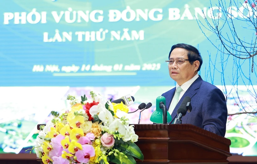 Prime Minister Pham Minh Chinh addresses the fifth meeting of he Coordinating Council for Red River Delta Region in Hanoi on January 14 (Photo: VNA)