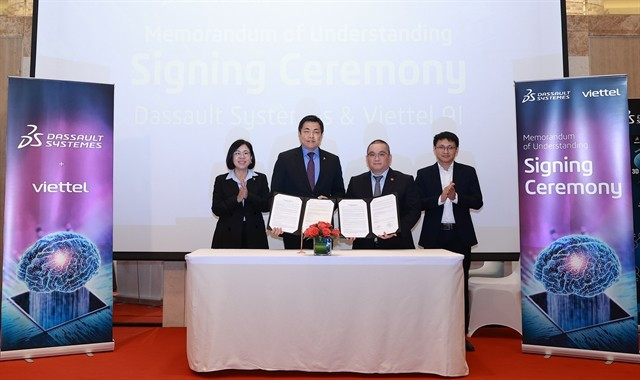 Representatives from Dassault Systèmes and Viettel pose for a photo after signing the MoU. (Photo courtesy of Dassault Systèmes)