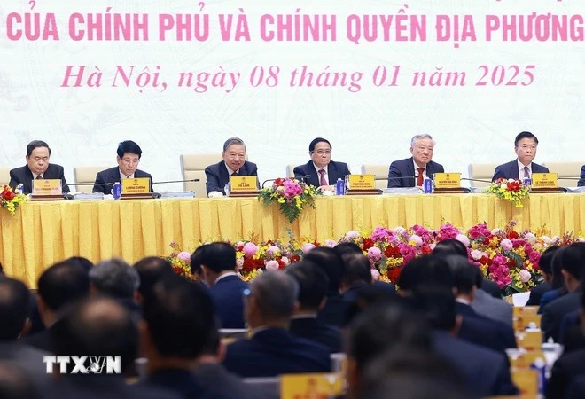 Party General Secretary To Lam (third from left), State President Luong Cuong (second from left), Prime Minister Pham Minh Chinh (fourth from left) and National Assembly Chairman Tran Thanh Man (first from left), and other officials attend the conference on January 8. (Photo: VNA)