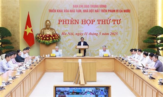 PM Pham Minh Chinh speaks at the meeting. (Photo: VNA)