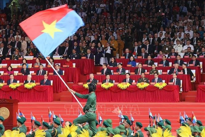 An art performance held at the grand ceremony and parade (Photo: VNA)