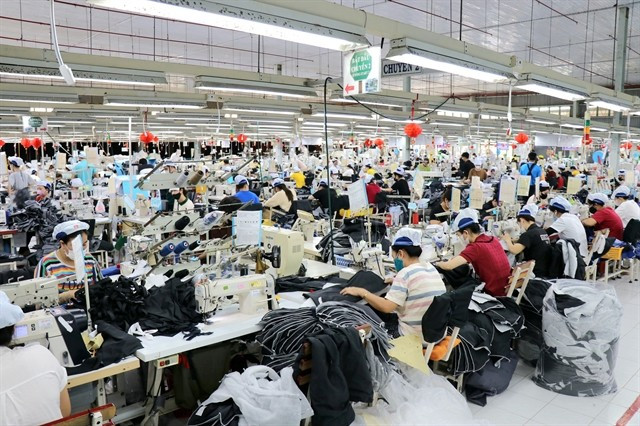 Tien Thuan Garment Company in Khanh Hoa Province. The Ministry of Home Affairs has proposed creating a centralised national platform for electronic labour contracts. (Photo: VNA)