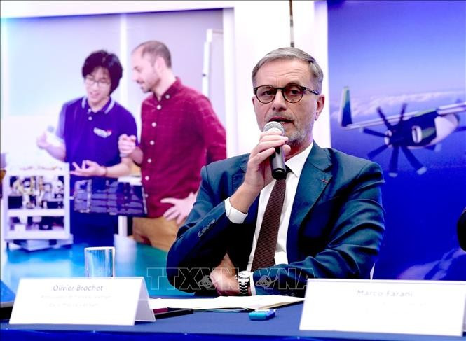 French Ambassador Olivier Brochet speaks at the press conference in Hanoi on December 11 to mark the 10th anniversary of the Paris Agreement on climate change and highlighting the COP30 outcomes. (Photo: VNA)