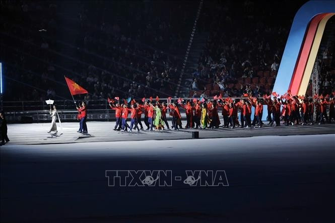 The Vietnam sports delegation at the opening ceremony of SEA Games 33. (Photo: VNA)