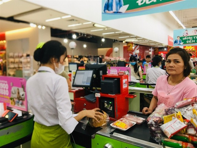 The total retail sales of goods and consumer service revenue were estimated at 5.7 quadrillion VND for the first 10 months of the year. (Photo: VNA)