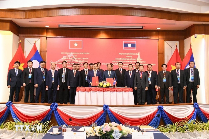 Delegates at the ministerial-level bilateral conference between the Ministries of Public Security of Vietnam and Laos on December 6, 2025 (Photo: VNA)
