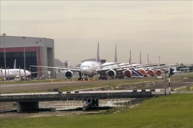 Aircraft park at Bangkok Suvarnabhumi Airport in Bangkok, Thailand. (Photo: AFP/VNA)