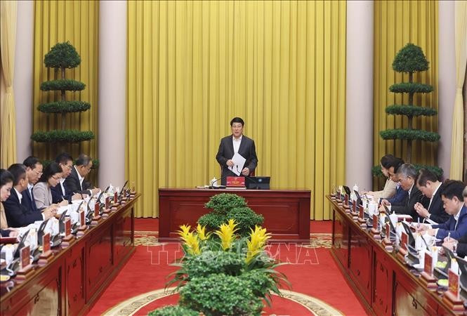 State President Luong Cuong chairs a meeting with the Presidential Office on December 31 to review its December performance and set key duties for January 2026. (Photo: VNA)