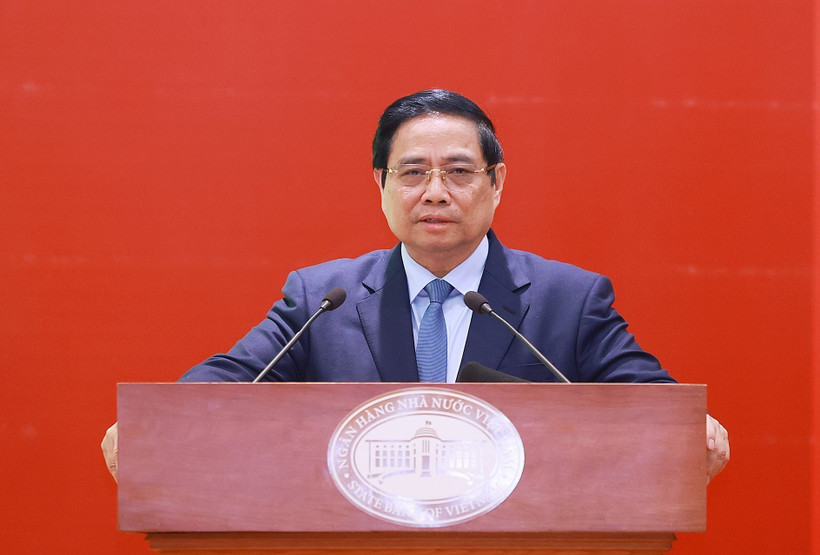 Prime Minister Pham Minh Chinh speaks at the State Bank of Vietnam (SBV)'s Hanoi conference to review its 2025 performance and launch tasks for 2026 on December 31. (Photo: VNA)