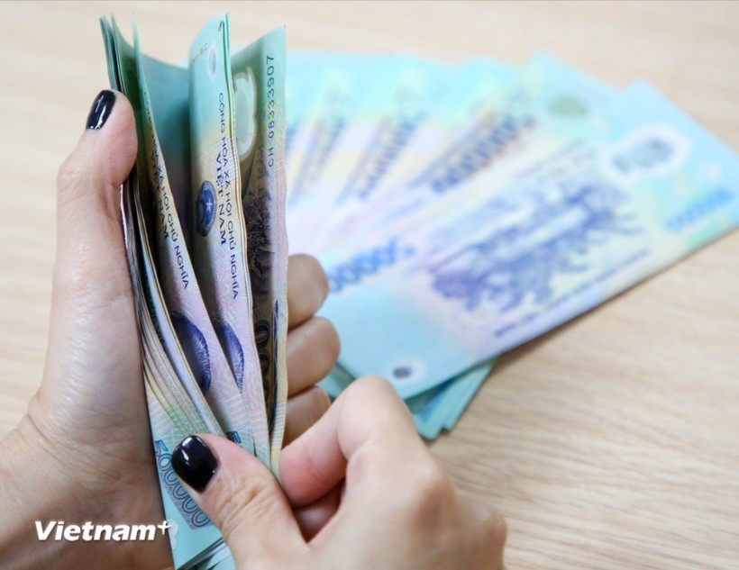 The daily reference exchange rate is set at 25,187 VND/USD on October 1. (Photo: VNA)