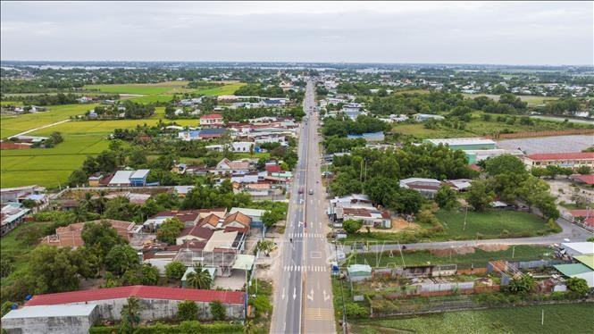 National Highway 22B, the main route connecting Ho Chi Minh City with Moc Bai International Border Gate, Tay Ninh Province, has not met transportation needs. The Ho Chi Minh City - Moc Bai Expressway is expected to reduce transportation pressure. (Photo: VNA) 