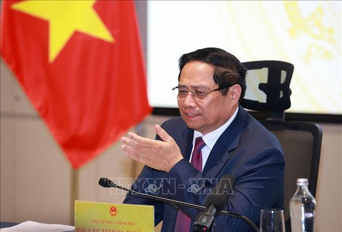 Prime Minister Pham Minh Chinh speaks at the 23rd meeting of the National Steering Committee for Combating IUU Fishing in HCM City on November 25. (Photo: VNA)