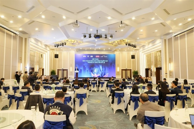 A view of the workshop on protecting national financial security in the digital age on December 23. (Photo: thoibaonganhang.vn)