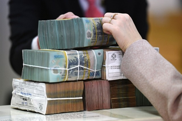 The codification of Resolution 42 into the law, effective from mid this month, is an important step, marking a key milestone in completing Vietnam’s NPL resolution process. (Photo: thoibaonganhang.vn)