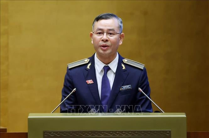 Auditor General Ngo Van Tuan delivers a report on the performance of the State Audit Office of Vietnam during the 2021–2026 tenure. (Photo: VNA)