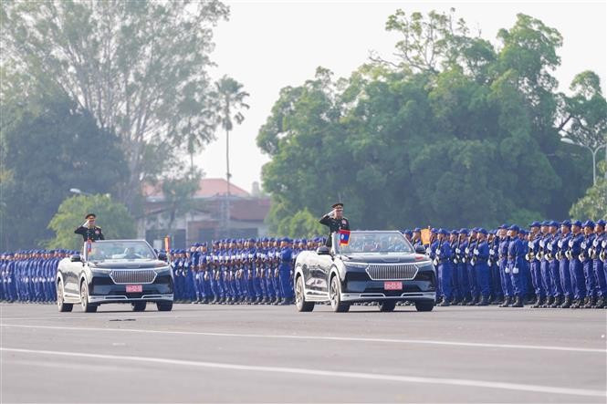 The joint rehearsal of the military and police forces takes place on the morning of November 12 at Thatluang Square in Vientiane (Photo: VNA)