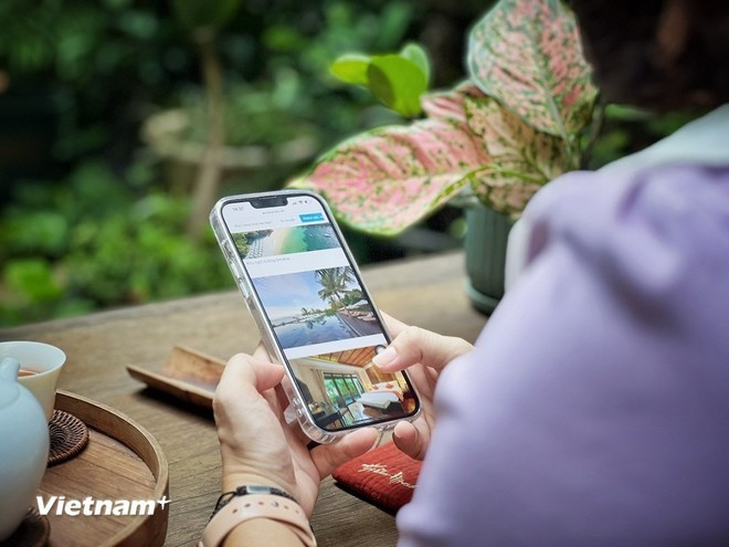Travellers now enjoy richer experiences with diverse destination options available right at their fingertips via online platforms. (Illustrative photo: VietnamPlus)