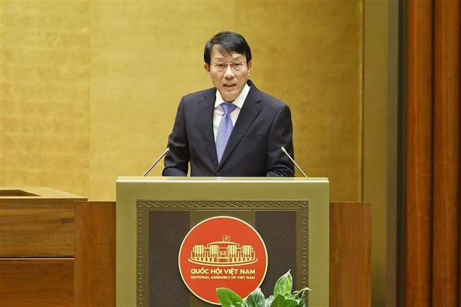 Minister of Public Security Luong Tam Quang presents the proposal on four draft laws at the National Assembly sitting on October 31. (Photo: VNA)