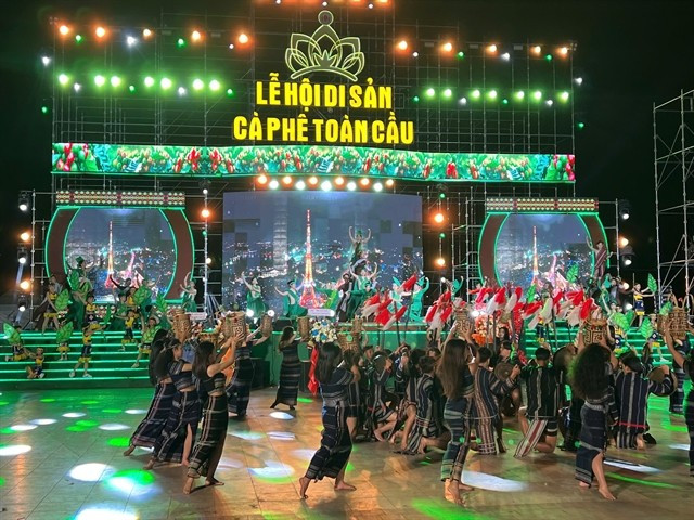 A folk dance is performed at the opening ceremony of the first Global Coffee Heritage Festival. (Photo: VNA)