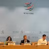 The Presidium at the recent formal meeting of the Committee of Participants on the Expansion of Trade in Information Technology Products. (Photo: VNA)