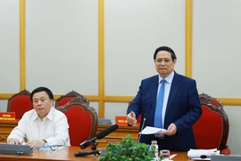Politburo member and Prime Minister Pham Minh Chinh speaks at the working session. Photo: VNA