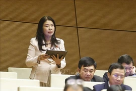Deputy Le Thu Ha from Lao Cai province speaks at the 10th session of the National Assembly in Hanoi on December 5, 2025. Photo: VNA