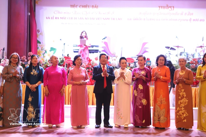 The Executive Committee of the Vietnam Ao Dai Heritage Club in Laos make debut. (Photo: VNA)