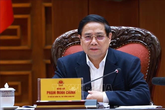 Politburo member, Secretary of the Government’s Party Committee, and Prime Minister Pham Minh Chinh speaks at the conference. (Photo: VNA)