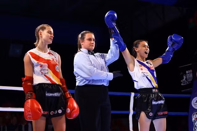 Huynh Ha Huu Hieu celebrates when she is announced world champion of the women's 45kg category. ( Photo of IFMA) 