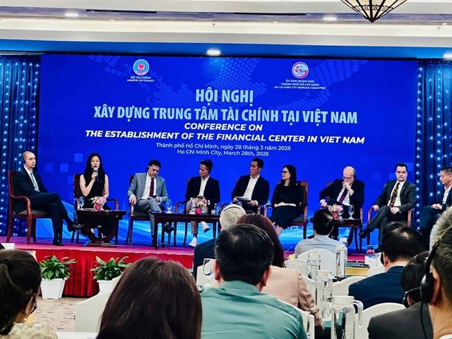 Speakers at a conference in HCM City on March 28 on creating a financial centre in Vietnam (Photo: VNA). 