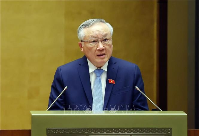 Permanent Deputy Prime Minister Nguyen Hoa Binh reports on the Government's performance during 2021–2026 at the 10th session of the 15th National Assembly on October 20, 2025. (Photo: VNA)