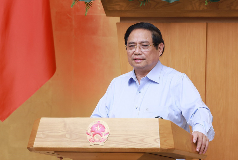 Prime Minister Pham Minh Chinh speaks at the meeting. (Photo: VNA)
