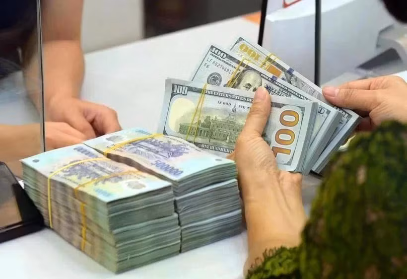 The daily reference exchange rate is set at 25,637 VND/USD on September 18. (Photo: VNA)