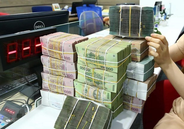 Reference exchange rate down 19 VND at week’s beginning ảnh 1