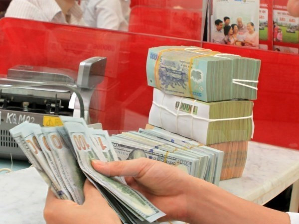 Reference exchange rate down 4 VND ảnh 1