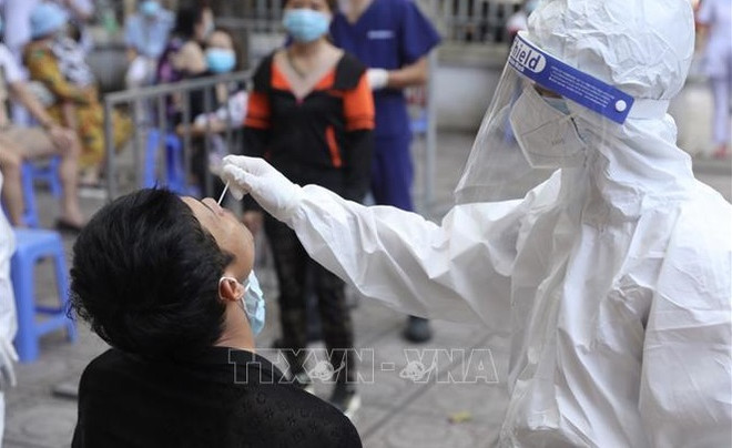 Programme launched to assist workers in HCM City as social distancing loosened ảnh 1