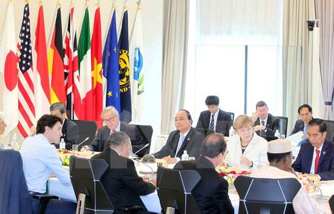 Vietnam calls for more G7 support in climate change response ảnh 1