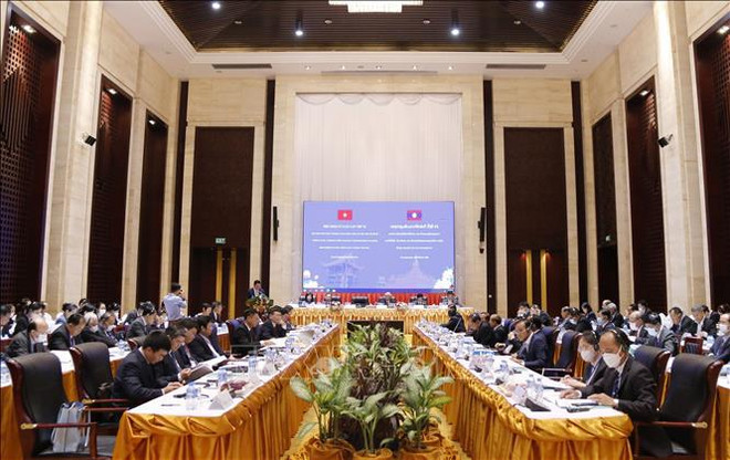 Vietnamese, Lao parties hold ninth theoretical workshop ảnh 1 Vietnamese, Lao parties hold ninth theoretical workshop ảnh 1