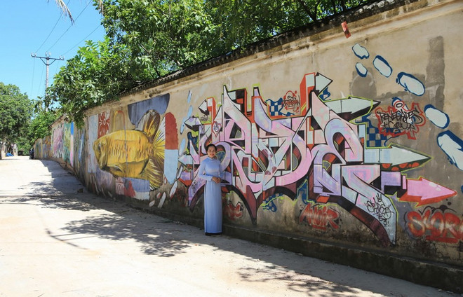 Mural paintings give Hue's old walls new look ảnh 3
