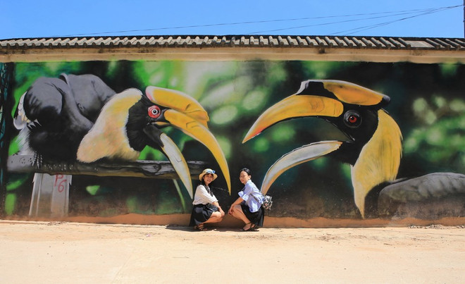 Mural paintings give Hue's old walls new look ảnh 2 Mural paintings give Hue's old walls new look ảnh 2