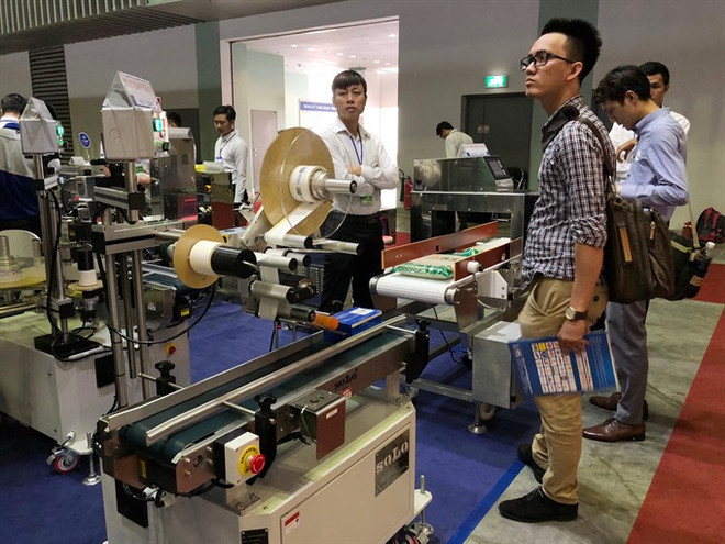 Farm produce, agricultural machinery fairs open in HCM City ảnh 1