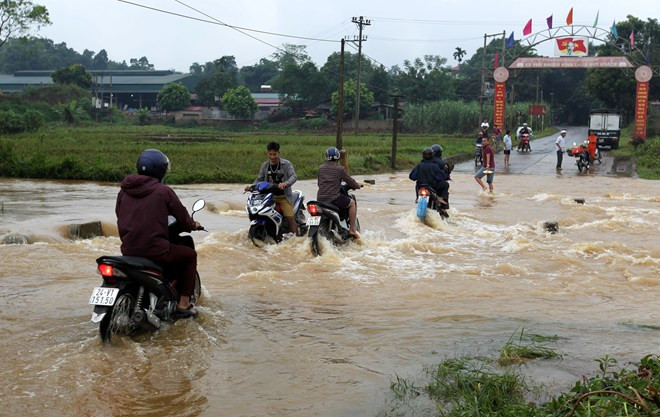 Downpours, flooding wreak havoc in northern localities ảnh 1