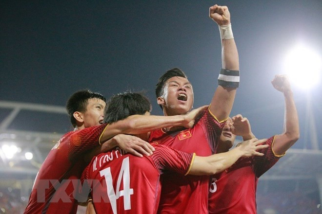 Asian media laud Vietnam’s victory at AFF Suzuki Cup semifinals ảnh 1