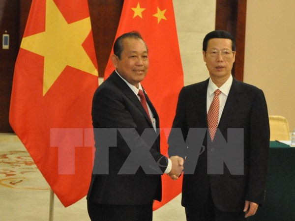 Deputy PM meets Chinese Vice Premier, urging stronger cooperation ảnh 1 Deputy PM meets Chinese Vice Premier, urging stronger cooperation ảnh 1