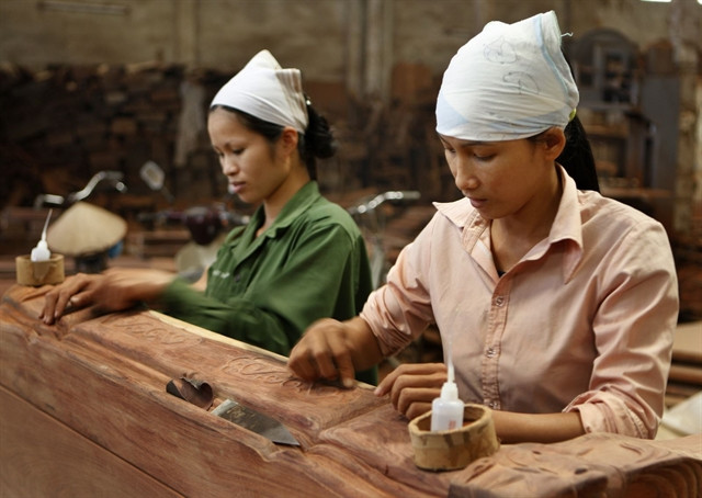 Deputies debate 30 percent tax exemption for SMEs ảnh 1