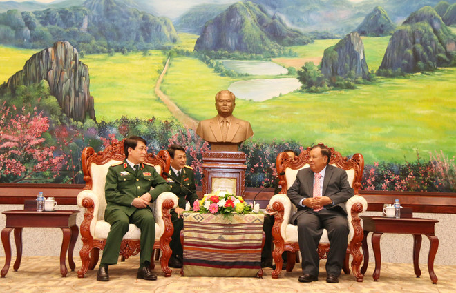 Lao Party General Secretary speaks of military cooperation with VN ảnh 1